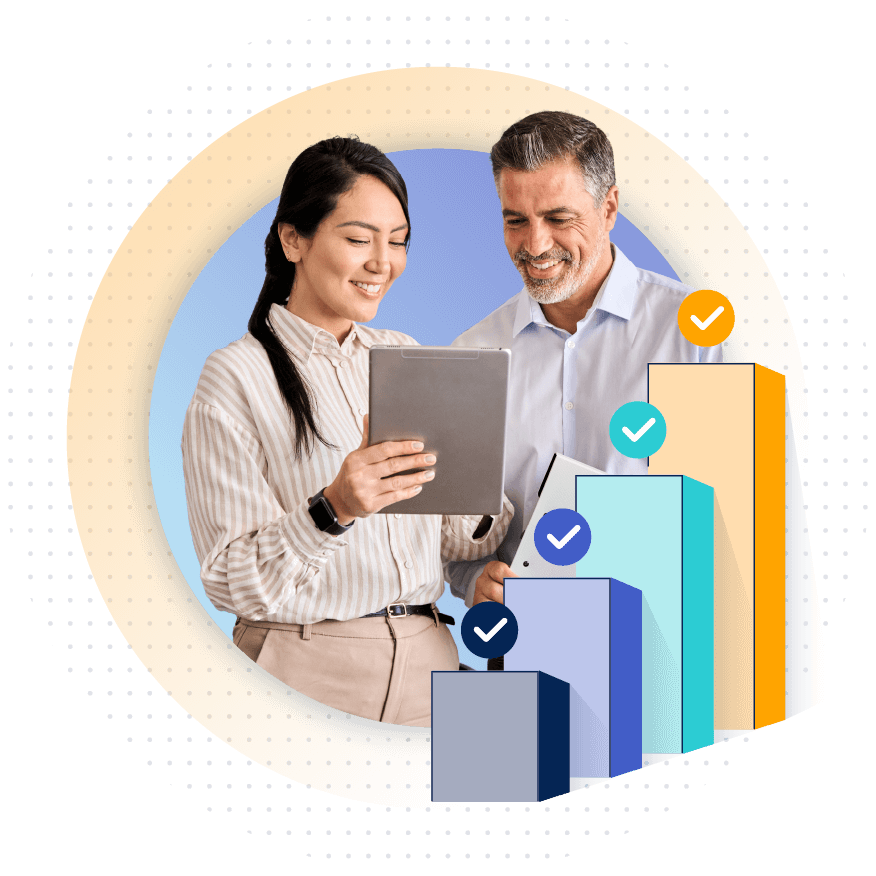 two people in an office looking at a tablet