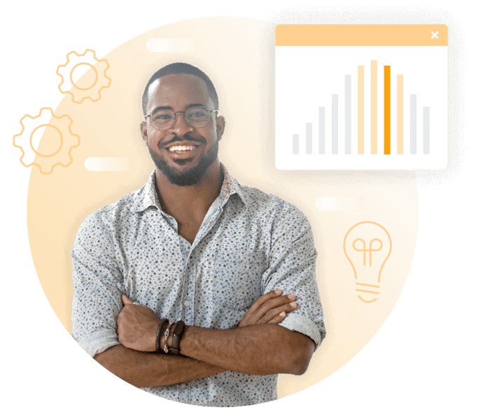 Man smiling next to data chart