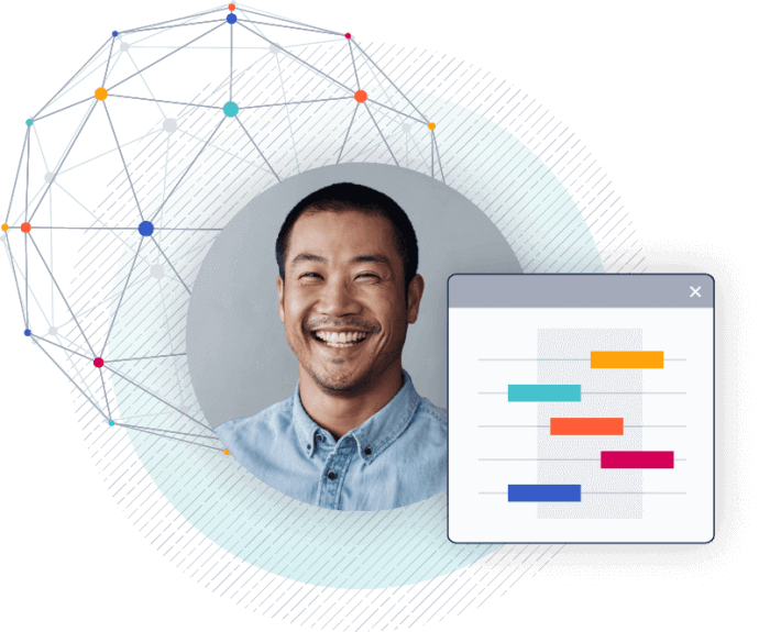 man smiling next to chart