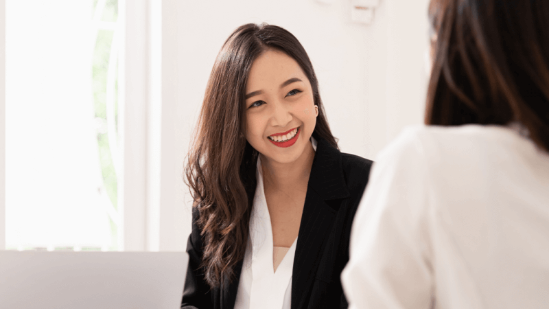 Woman conducting a structured interview with a candidate