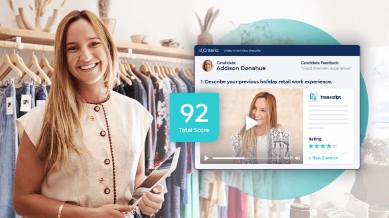 Female manager standing in front of clothing rack at retail store with a screenshot of Criteria's IIQ product showing a high candidate match.