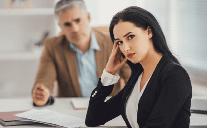 Woman looking annoyed while in a job interview
