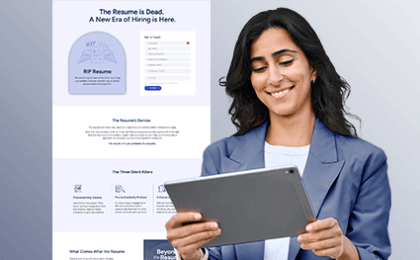 woman looking at tablet smiling