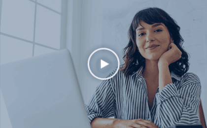 Woman smiling over computer